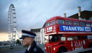 A bus displays a thank you message to the NHS on Westminster Bridge before the Clap for our Carers campaign in support of the NHS, following the outbreak of the coronavirus disease (COVID-19), in London, Britain, April 30, 2020. REUTERS/Henry Nicholls