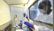 A laboratory technician is seen at the Inselspital Universitaetsspital Bern university hospital during researches for a vaccine against the coronavirus disease (COVID-19) in Bern, Switzerland April 22, 2020. Picture taken April 22, 2020. REUTERS/Arnd Wieg