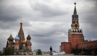 TOPSHOT - A man walks on Red Square in downtown Moscow on May 6, 2020, amid the spread of the new coronavirus COVID-19. / AFP / Alexander NEMENOV