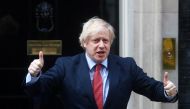 Britain's Prime Minister Boris Johnson reacts outside 10 Downing Street during the Clap for our Carers campaign in support of the NHS, following the outbreak of the coronavirus disease (COVID-19), London, Britain, May 7, 2020. Reuters/Hannah McKay/File Ph