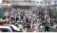 ISLAMABAD, PAKISTAN, MAY 9: Pakistani vendors purchase seasonal fruits at the main fruit and vegetables market during the Muslim's holy month of Ramadan as Pakistan gradually ease nationwide coronavirus related 