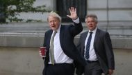 :LONDON, UNITED KINGDON - MAY 06: Britain's Prime Minister Boris Johnson (L) returns to Downing Street after his daily walk in Westminster in London, United Kingdom on May 06, 2020. ( Isabel Infantes - Anadolu Agency )
