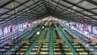 A general view shows a makeshift hospital ward for the treatment of COVID-19 coronavirus contaminated patients at the Bashundhara Convention Centre in Dhaka on May 13, 2020. / AFP / MUNIR UZ ZAMAN