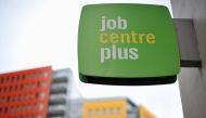 (FILES) In this file photo taken on October 12, 2011 a Job Centre Plus sign is pictured in central London. British unemployment jumped in the first quarter on the back of coronavirus, despite a lockdown being imposed only near the end of the period, offic