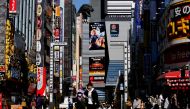 FILE PHOTO: The head of Godzilla, a Japanese monster movie character, is seen on a building of Toho Cinema in Tokyo, Japan, February 18, 2019. REUTERS/Kim Kyung-hoon/File Photo