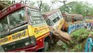 A bus damaged by a fallen tree due to Cyclone Amphan, is seen in Kolkata, West Bengal, India, May 21, 2020, in this still image from video. ANI via REUTERS
