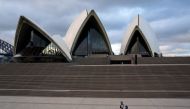 Police officers patrol near the Sydney Opera House following the implementation of stricter social-distancing and self-isolation rules to limit the spread of the coronavirus disease (COVID-19) in Sydney, Australia, April 6, 2020. REUTERS/Loren Elliott/Fil