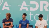 Tennis players Novak Djokovic (C), Dominic Thiem (not seen), Alexander Zverev (L), Grigor Dimitrov (R) attend a press conference during an opening program of the Adria Tour, a charity exhibition hosted by Novak Djokovic Foundation, on June 12, 2020 in Bel