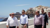 Greek Prime Minister Kyriakos Mitsotakis visits the town of Fira, following the easing of measures against the coronavirus disease (COVID-19), on the island of Santorini, Greece, June 13, 2020. Dimitris Papamitsos 

