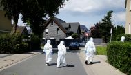 Members of a mobile testing unit of the German Army and German Red Cross arrive to test residents for the coronavirus disease (COVID-19), following an outbreak of the disease at Toennies meat factory, where employees remain under lockdown, in Guetersloh, 