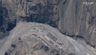This handout satellite image taken on May 22, 2020, released by Maxar Technologies shows China's People's Liberation Army (PLA) base in Galwan Valley, bordering between India and China. AFP PHOTO / Satellite image ©2020 Maxar Technologies 