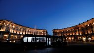 An empty bus is seen in Piazza della Repubblica, following the coronavirus disease (COVID-19) outbreak, in Rome, Italy, June 24, 2020. Picture taken June 24, 2020. REUTERS/Yara Nardi