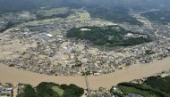 An aerial view shows flooded Kuma River caused by a heavy rain at a residential area in Hitoyoshi, Kumamoto prefecture, southern Japan, in this photo taken by Kyodo July 4, 2020. Mandatory credit Kyodo/via REUTERS 