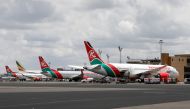 Kenyan Airways planes are parked at the Jomo Kenyatta International Airport in Nairobi, Kenya, March 24, 2020. REUTERS/Baz Ratner/File Photo