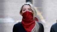 Amber Heard, American actress and former wife of Hollywood actor Johnny Depp, arrives on the first day of libel trial brought by Hollywood actor Johnny Depp against News Group Newspapers (NGN), at the High Court in London, on July 7, 2020. AFP / Tolga AKM