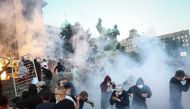 Ten police officers were injured during a second night of clashes in Belgrade with protesters angry over the government's handling of the coronavirus pandemic, a minister said Thursday.