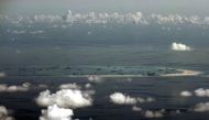 An aerial photo shows the alleged on-going land reclamation by China on mischief reef in the Spratly Islands in the South China Sea, May 11, 2015. Reuters / Ritchie B Tongo