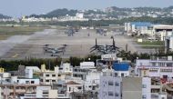 (FILES) This file photo taken on November 14, 2014 shows multi-mission tiltrotor Osprey aircraft at the US Marine's Camp Futenma in a crowded urban area of Ginowan, Okinawa prefecture. AFP / TORU YAMANAKA