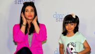 (FILES) In this file photo taken on November 20, 2019 Indian Bollywood actress Aishwarya Rai Bachchan (L) and daughter Aaradhya Bachchan pose during an event with NGO Smile Train India to bring awareness about cleft lip and palate, in Mumbai. AFP / Sujit 