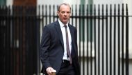 Britain's Foreign Secretary Dominic Raab arrives at Downing Street ahead of a cabinet meeting in London, Britain, July 14, 2020. REUTERS/Hannah McKay
