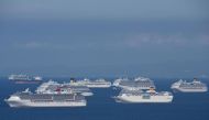 This file photo taken on May 31, 2020 shows a general view of cruise ships anchored at Manila Bay waiting for disembarkation clearance from authorities for their Filipino crews who have undergone swab tests for the COVID-19 coronavirus, according to the P