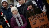 Swedish climate activist Greta Thunberg takes part in a protest outside the EU Council as EU environment ministers meet in Brussels, Belgium, March 5, 2020. REUTERS/Johanna Geron/File Photo