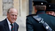 Britain's Prince Philip speaks to Assistant Colonel Commandant, Major General Tom Copinger-Symes during the transfer of the Colonel-in-Chief of the Rifles at Windsor Castle in Britain July 22, 2020. The Duke of Edinburgh will step down from his role as Co