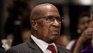 In this file photo taken on March 14, 2018 Former apartheid struggle stalwart and one of the last two surviving Rivonia triallists Andrew Mlangeni looks on at the inaugural George Bizos Human Rights Award in Johannesburg. Andrew Mlangeni, a former aparthe