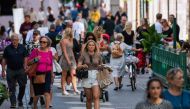 People walk in Stockholm on July 27, 2020, during the novel coronavirus / COVID-19 pandemic.  / AFP / Jonathan NACKSTRAND

