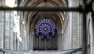 FILE PHOTO: The organ is pictured during preliminary work in the Notre-Dame Cathedral, three months after a major fire, in Paris, France July 17, 2019. Stephane de Sakutin/Pool via REUTERS/File Photo