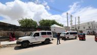An ambulance is seen near a blast site that rocked a military base in Mogadishu, Somalia August 8, 2020. REUTERS/Feisal Omar