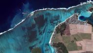 TOPSHOT - This August 12, 2020, handout satellite image obtained courtesy of Maxar Technologies shows an overview of the MV Wahashio shipwreck off the coast of Mauritius. AFP PHOTO / Satellite image ©2020 Maxar Technologies 