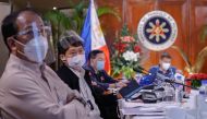 This handout photo taken on August 2, 2020 and received on August 17 from the Presidential Photo Division (PPD) shows Philippine Interior Minister Eduardo Ano (2nd L) attending an Inter-Agency Task Force on the Emerging Infectious Diseases (IATF-EID) meet