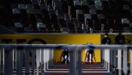 Athletes prepare to compete in men's 100m hurdles during the Golden Grand Prix 2020 athletics event at the National Stadium in Tokyo on August 23, 2020. / AFP / Philip FONG