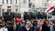 People take part in a rally against presidential election results near the Ministry of Education in Minsk, Belarus August 25, 2020. REUTERS/Vasily Fedosenko