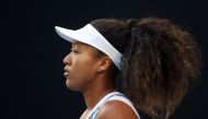 In this file photo taken on January 24, 2020 Japan's Naomi Osaka gets ready to face Coco Gauff of the US in their women's singles match on day five of the Australian Open tennis tournament in Melbourne.  / AFP / DAVID GRAY 