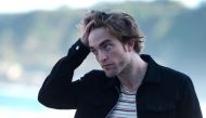 (FILES) In this file photo taken on September 27, 2018 British actor Robert Pattinson poses during a photocall to promote his film 