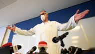 FILE PHOTO: Professor Alberto Zangrillo, head of ICU at San Raffaele Hospital, gestures as he wears a protective face mask during a news conference after Italy's former Prime Minister Silvio Berlusconi has been hospitalised for further checks after testin