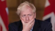 Britain's Prime Minister Boris Johnson speaks during a virtual press conference at Downing Street in central London on September 9, 2020 following an announcement of further restrictions on social gatherings in England due to an uptick in cases of the nov