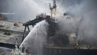 Fireboats battling to extinguish a fire on the Panamanian-registered crude oil tanker New Diamond. AFP 