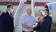 Belarusian President Alexander Lukashenko greets officials during a welcoming ceremony upon his arrival at an airport in Sochi, Russia September 14, 2020. Andrei Stasevich/BelTA