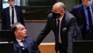 German Foreign Minister Heiko Maas chats with Polish counterpart Zbigniew Rau during a foreign affairs ministers council in Brussels, Belgium September 21, 2020. Olivier Hoslet/Pool via REUTERS