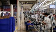 Workers are seen in RTE bicycles factory in Vila Nova de Gaia, Portugal, September 25, 2020. Picture taken September 25, 2020. REUTERS/Pedro Nunes