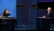 US Democratic vice presidential nominee and Senator from California, Kamala Harris (L) gestures toward US Vice President Mike Pence as she speaks during the vice presidential debate in Kingsbury Hall at the University of Utah on October 7, 2020, in Salt L