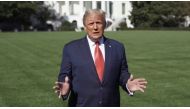 U.S. President Donald Trump speaks outside the White House, where he is being treated for the coronavirus disease (COVID-19), in Washington, U.S. in this still image taken from social media video released on October 8, 2020. @realDonaldTrump/via REUTERS