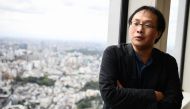 This photograph taken on September 29, 2020 shows Japanese film director Koji Fukada posing for AFP in Tokyo. AFP / Charly Triballeau  