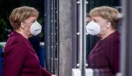 German Federal Chancellor Angela Merkel arrives for a round table meeting on the second day of a two days EU summit, in Brussels, on October 16, 2020. AFP / POOL / OLIVIER HOSLET