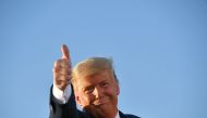 US President Donald Trump gives a thumbs up as he leaves a rally at Tucson International Airport in Tucson, Arizona on October 19, 2020. AFP / Mandel Ngan 