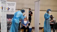 People get a free Covid-19 (coronavirus) test organised by the Greek National Health organisation at Athens central metro station on October 20, 2020. / AFP / Louisa GOULIAMAKI
