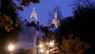 A street is seen in Montmartre few minutes before the nightly curfew due to restrictions against the spread of the coronavirus disease (COVID-19) in Paris, France, October 22, 2020. REUTERS/Charles Platiau
